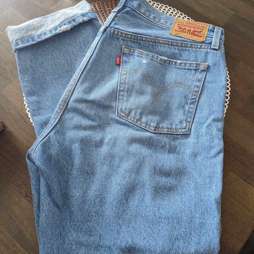BRAND NEW LEVIS JEANS (with holes)